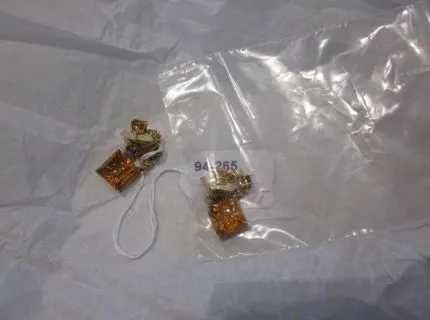 1 paire de boucles d'oreilles avec pierres de couleur, or jaune 750/000, 4 citrines env. 8,20 ct, 4 saphirs jaunes. Réf. : 763.0478