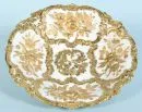 Display plate "Schwerter Meissen" – Porcelain, richly reliefed floral and ornamental decor with gold bronze, wavy rim, D= 30 cm, around 1900, 1st choice;
