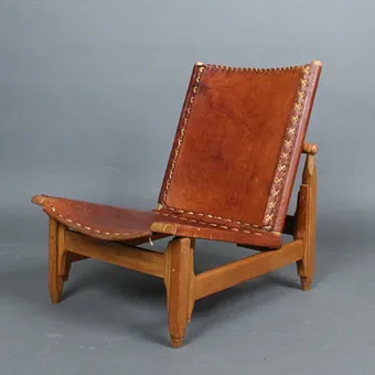 Werner Biermann for Arte Sano, armchair, leather, oak, 1960s, Colombia