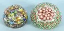 Paperweights, 2 Stück – farbloses Glas, eingeschlossene Millefioridekors, rund, H= 6/6,5 cm;