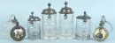 Bierpullen, 6 stuks – kleurloos glas/perstglas, elk met tinnen deksel, 2 met porseleinen inzetstukken "Koning Ludwig II en kasteelzicht", H= 16-22 cm, eind 19e eeuw, deels met gebruikssporen