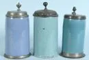 Cylindrical jugs, 3 pieces – faience, blue glaze, pewter lid, 2 with base ring, H= 21-23 cm, 18th/19th c., 2 glued, 1 with crack in the base