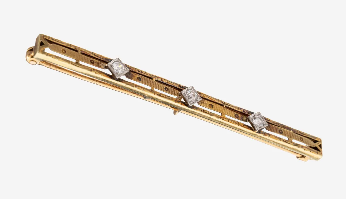 14 kt gouden diamanten broche, geel/witgoud 585/000, ongebruikelijk design, 1 briljant en 2