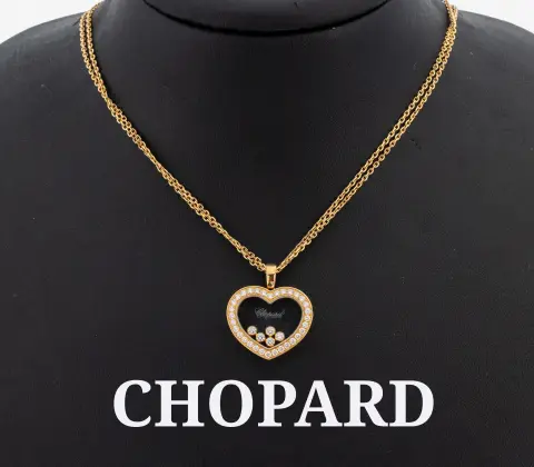 18 kt gouden CHOPARD briljant hanger, geelgoud 750/000, hart uit de Happy Diamonds serie, 5