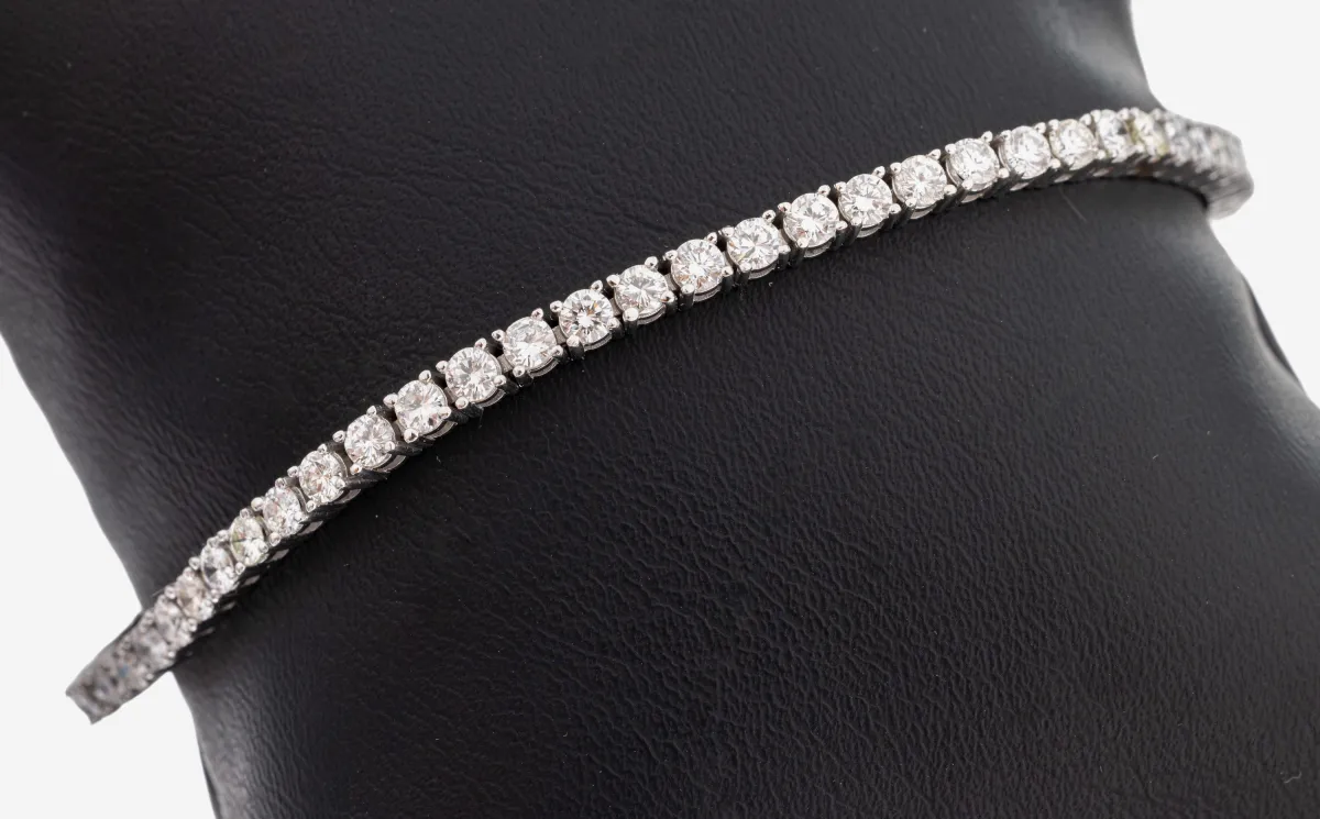 14 kt gold diamond line bracelet, WG 585/000, 60 brilliants total approx. 4.20 ct