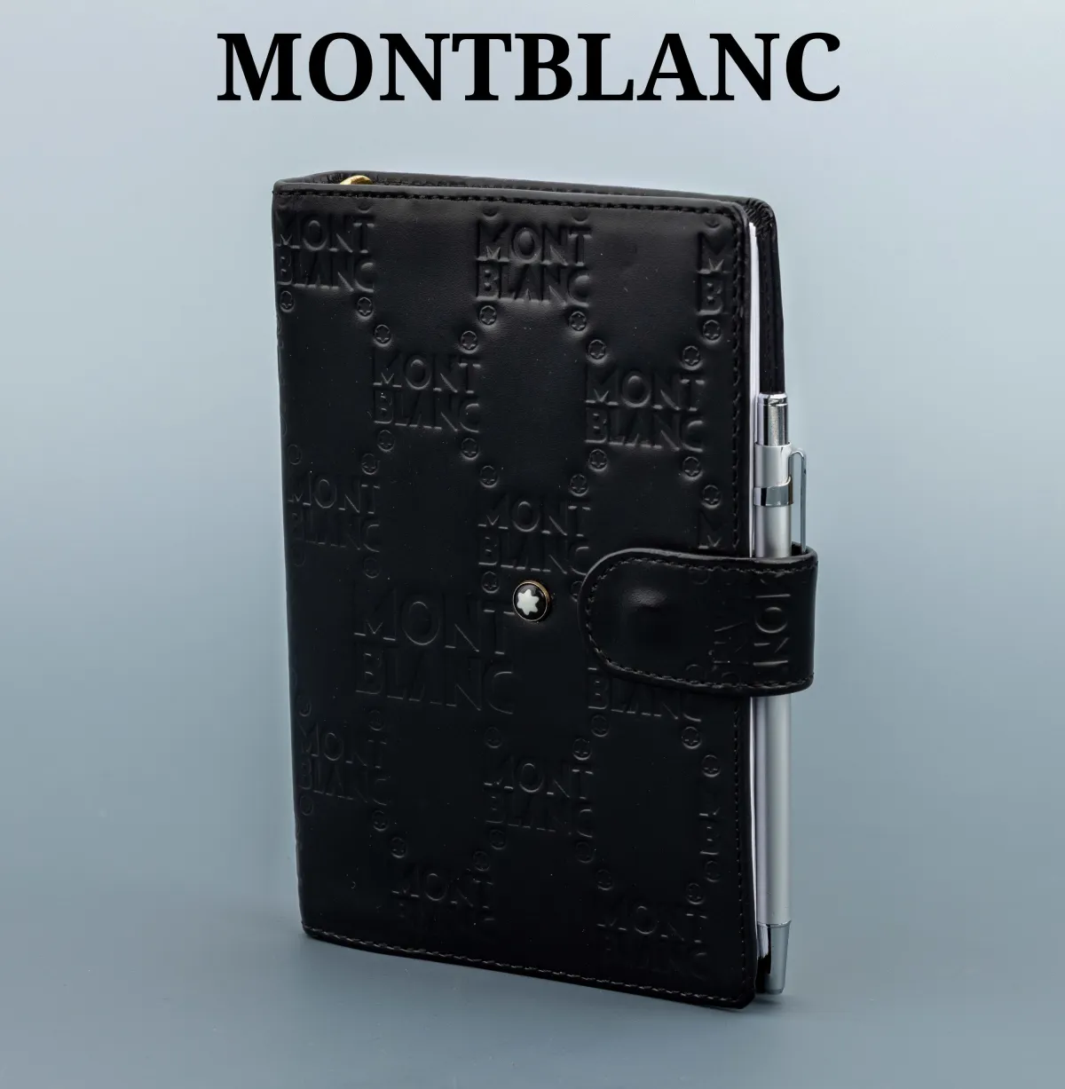MONTBLANC organizer, zwart kunstleer met meerdere MONTBLANC-embossingen, binnenin