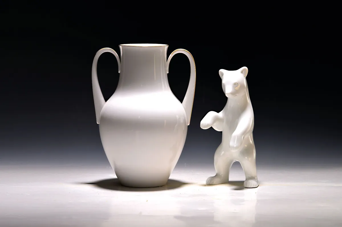 Double-handled vase and bear sculpture, KPM Berlin, 2nd half 20th c., white porcelain, vase with