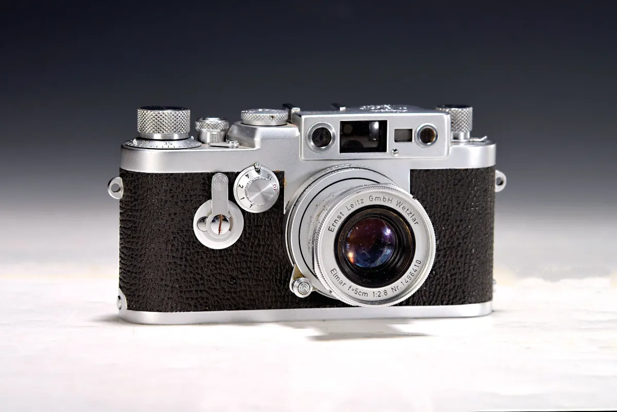 Leica IIIg, 1957, č. 880286, Elmar 50mm, 1:2, hledáček silně promáčknutý,