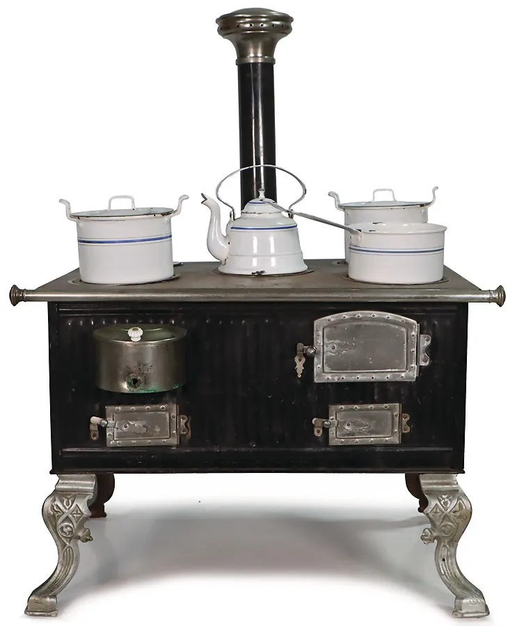 Cuisinière de maison de poupée