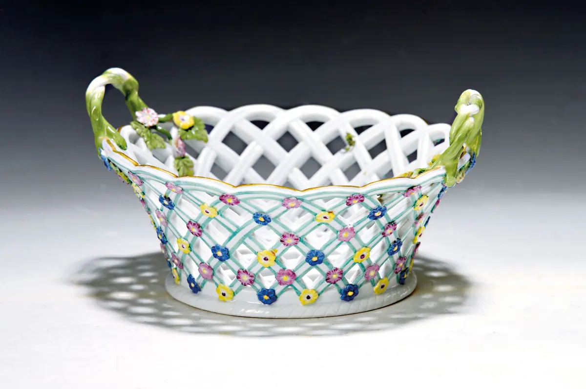 Round basket bowl, Meissen, circa 1750, branch handles, wall and base in openwork