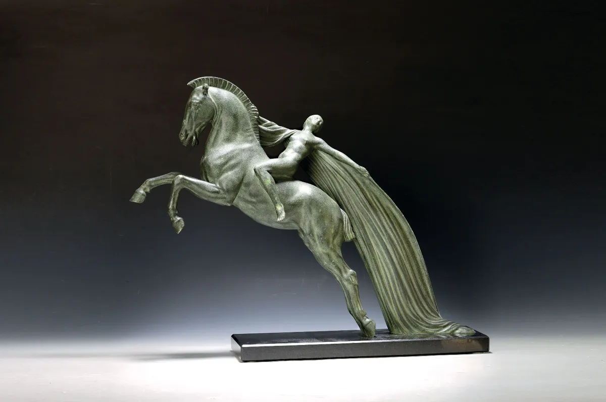Charles Charles, 1888-1977, Chevauchée, green patinated metal, marble base, signed C