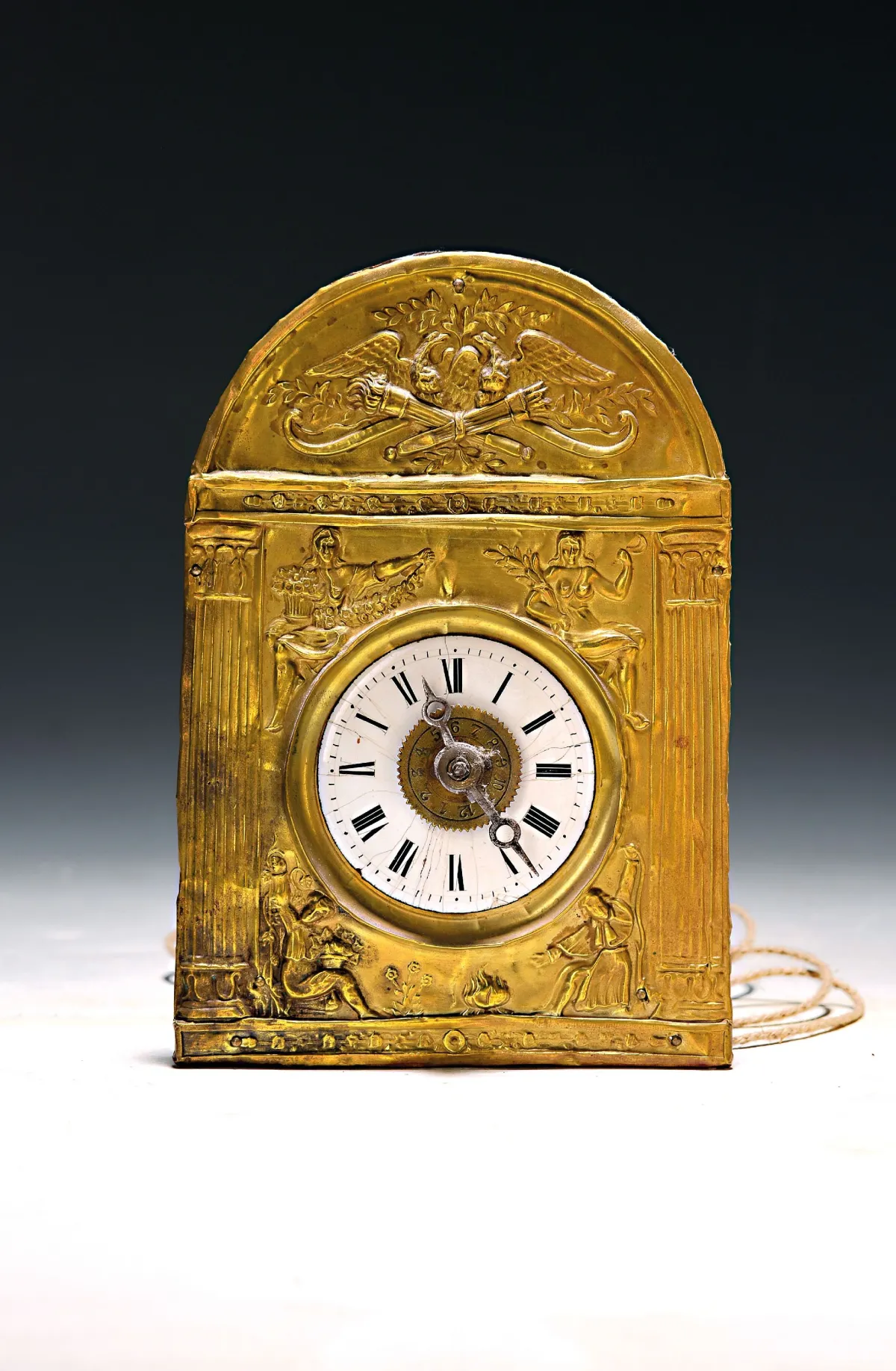 Small Black Forest clock with brass plaque and alarm, circa 1860/70, embossed brass front,