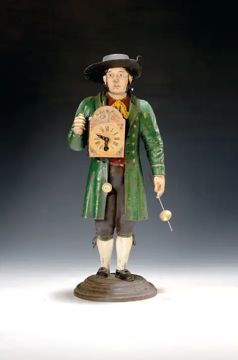 Zogenaamde Schwarzwälder klokdrager, Schwarzwald, circa 1850, tinnen figuur op sokkel, beschilderd