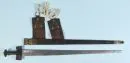 Schwert - Takouba – Eisengriff mit Leder, Stahlklinge, Lederscheide mit Metallmontierungen, L= 95 cm, Tuareg, Nordafrika;