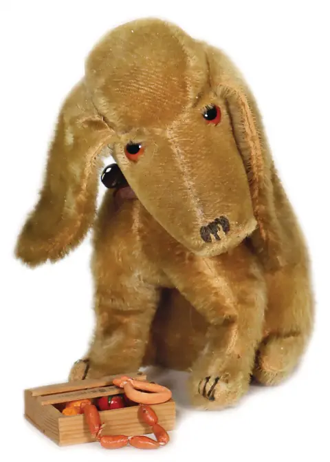 Typ Treff, chien assis à l'expression mélancolique