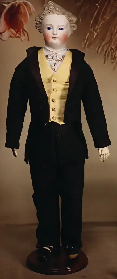 Poupée allemande en biscuit représentant un gentleman avec cheveux bruns et yeux de verre bleus