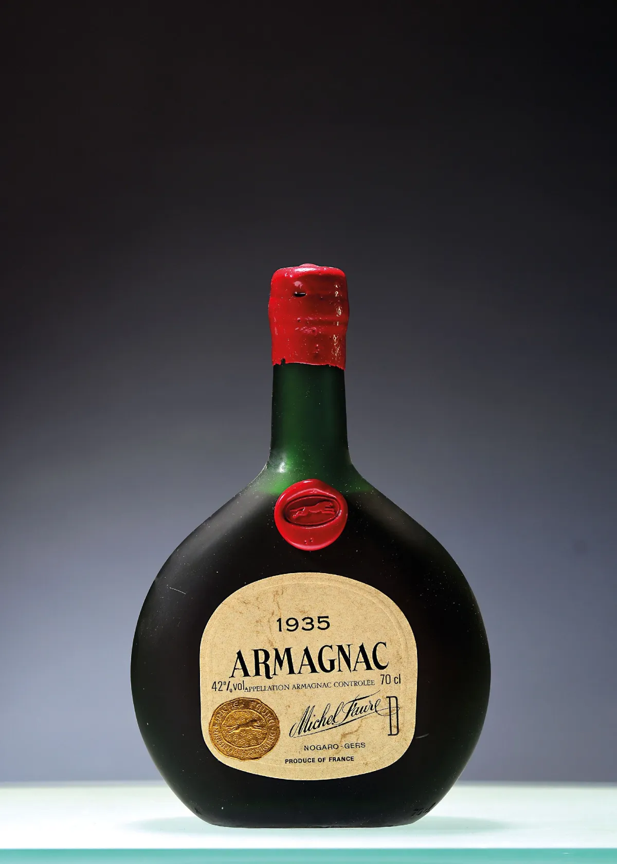 1 Flasche 1935 Michel Faure Armagnac, ca. 70cl, 42%Vol. in orig. Holzschuber