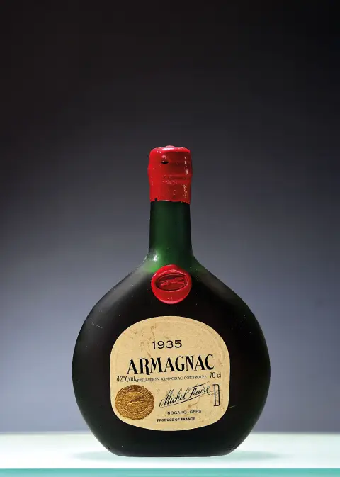 1 bouteille Armagnac Michel Faure 1935, env. 70cl, 42%vol, dans étui en bois d'origine