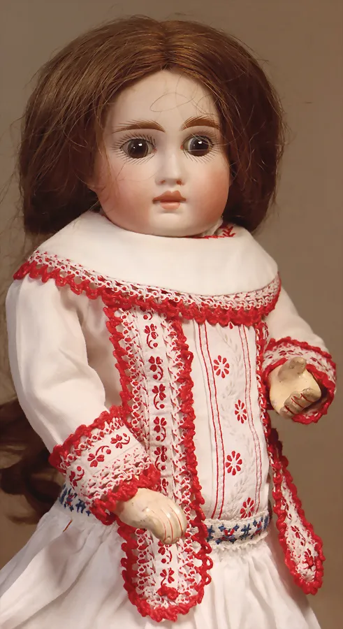 Tête complète en porcelaine biscuit avec joues rondes