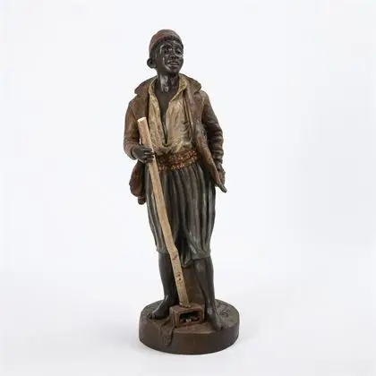 Afrikaanse jongen met schoenpoetsgerei