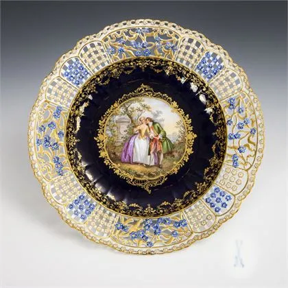 Pierced plate with cobalt ground and Watteau painting. Meissen