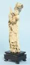 Geisha with fan and rose – ivory figure, H= 22 cm, on ebonized wooden base, total H= 26 cm, China, circa 1900, head with small crack