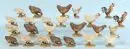 Coqs et poules, 24 pièces – bois, polychrome, H= 7-10 cm