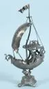 Table decoration - sailing ship "Nef" – tin, round base on ball feet, shaft as fish figure, sails with engraved motto and dat. 1760