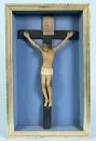 Christ corpus with cross – wax corpus with cloth, bakelite cross, in blue-painted case with gold frame, total 42 x 26 cm, circa 1900;