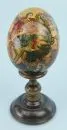 Icon egg "St. George" – wood, lacquered, hand-painted and monogrammed, H= 11 cm, with turned stand, probably Greece, 20th c.