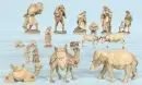 Figurines de crèche, 16 pièces – bois, partiellement teinté brun, H= 2-15 cm, dont Sainte Famille, paysans, chameaux, éléphant