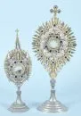 Monstrances, 2 pieces – Pewter, richly relief-decorated and openwork, each with glass capsule, H= 27/35 cm, for house altars