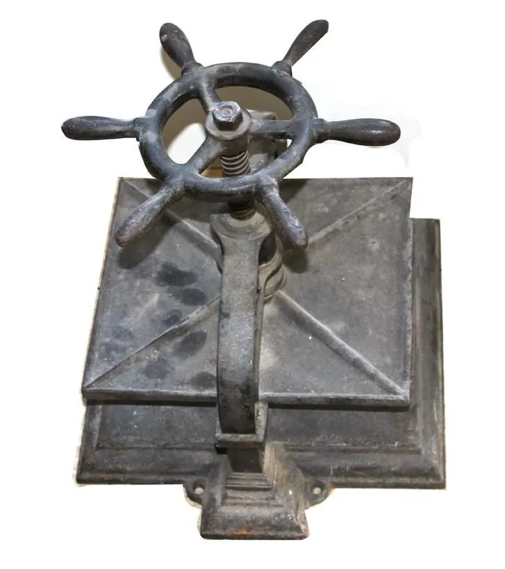 Book press – Cast iron press circa 1900 with steering wheel-shaped handwheel
