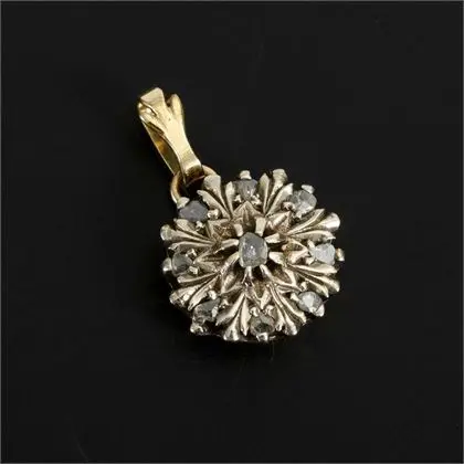 Pendant made from historic floral element