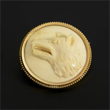 Historic brooch with wolf's head