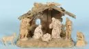 Weihnachtskrippe – Holz, braun gebeizt, 17 x 24 x 14 cm, mit 7 Holzfiguren, H= 3-9,5 cm;