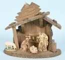 Crèche de Noël – bois, teinté brun, 23 x 27 x 13 cm, avec 4 figurines en bois peintes, H= 3-9,5 cm
