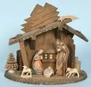 Crèche de Noël – bois, teinté brun, 23 x 27 x 13 cm, avec la Sainte Famille et 2 moutons en bois, H= 2,5-11,5 cm