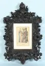 Cadre en bois, teinté brun, décor d'acanthe sculpté et ajouré, fenêtre 26 x 18,5 cm, total 61 x 38 cm