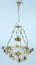 Lustre – cercle en laiton, décor richement reliefé et ajouré, 9 bougeoirs incurvés et pendeloques en verre taillé (incomplet), électrifié