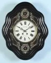 Wanduhr - Rahmenuhr – Holz, ebonisiert, geschwungener, ovaler Rahmen, innen mit reichen Perlmutteinlagen, verglastes Emaillezifferblatt bez.…