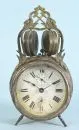 Alarm clock – round copper body, decorated brass crown, glazed dial, Roman numerals, manual winding, alarm strike on 2 bells, H= 22 cm, signs of use and age