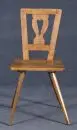 Chaise à dossier – merisier, 4 pieds coniques évasés, dossier avec barre décorative courbée, H= 92 cm, 19e s.;