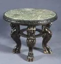 Table – Hardwood, dark stained, richly carved decorations, 4 curved legs as mythical creatures on ring stretcher, …