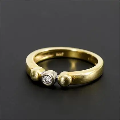 Ring with diamond solitaire