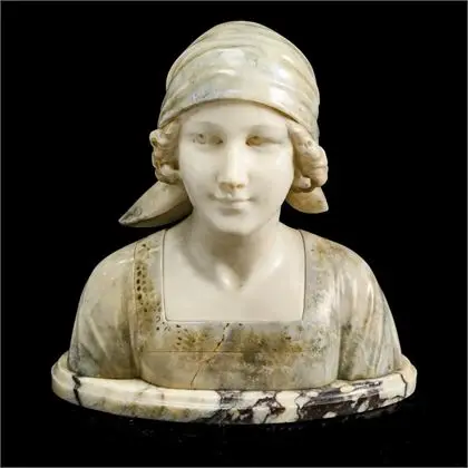 D'ASTE, Joseph (1881 Naples - 1945 Paris). Buste en onyx multicolore d'une jeune femme avec foulard