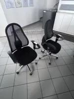2 chaises pivotantes avec accoudoirs