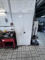 1 metal tool cabinet with various small tools