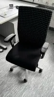 2 chaises pivotantes avec accoudoirs