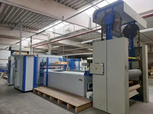 Wemhöner - Membrane vacuum press with 3 paternoster magazines